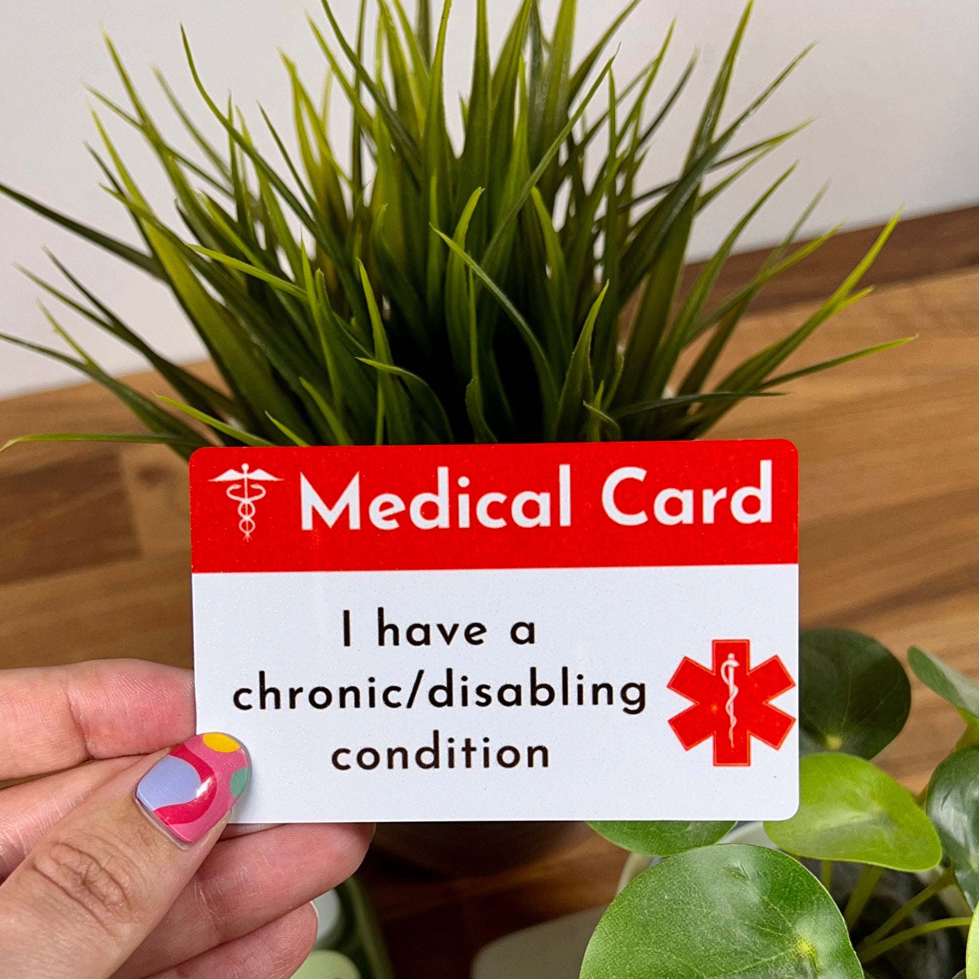 medical ID card, reading "I have a chronic/ disabling condition" on the front 